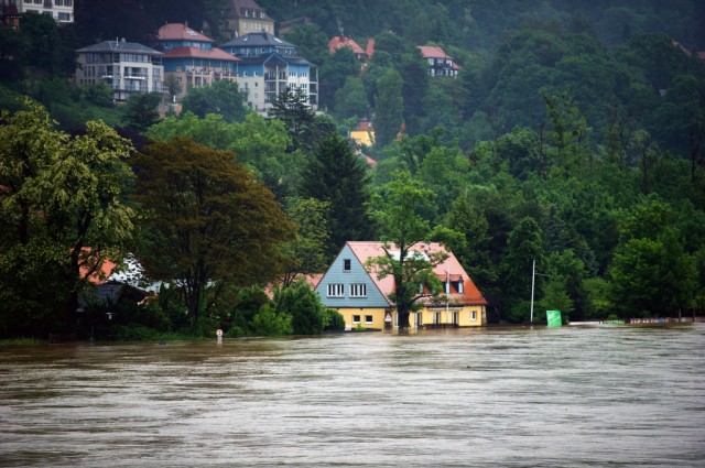 Houses flooded by the Elbe, Dresden, Germany (Photo: NYT|Arno Burgi/DPA, via Agence France-Presse — Getty Images)