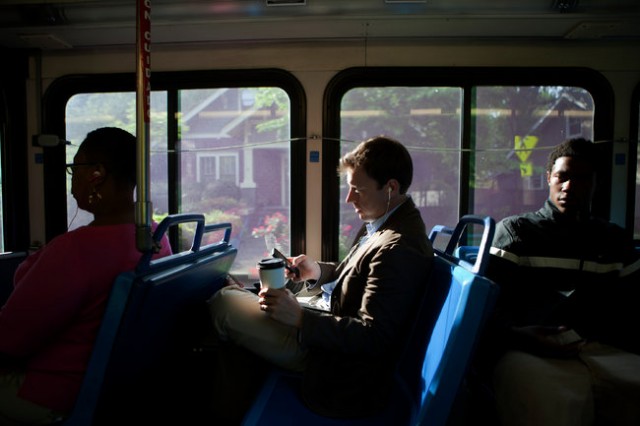 Meanwhile, young Americans are beginning to find smart phones more interesting than cars. (Photo: NYT)