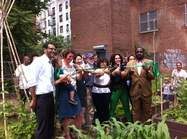 A ribbon cutting for the new Keap Fourth Community Garden in Brooklyn, which was created with 596 Acres' help.