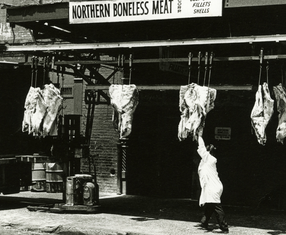 The neighborhood up through the 1990's was a center for wholesale meat distributors. Washington Street (Photo by Eugene Gordon, courtesy New-York Historical Society)