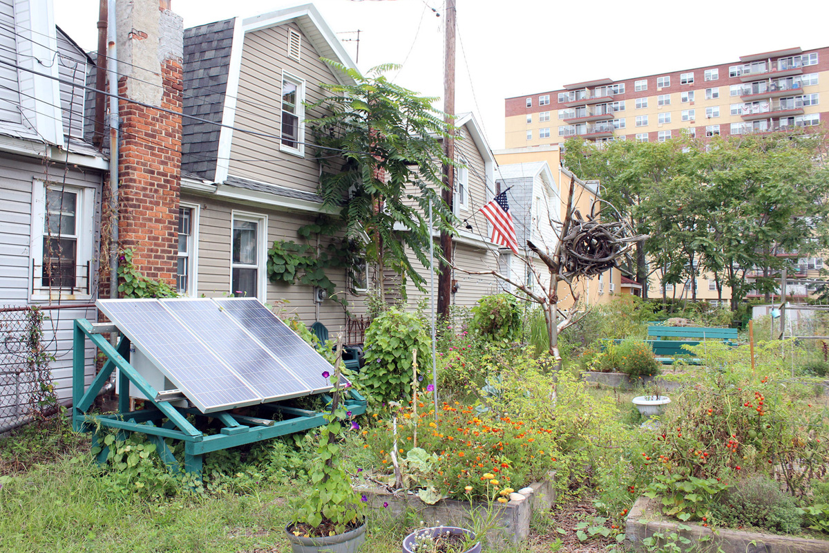Solar panels that provided power in the wake of Sandy stay connected in a Rockaway community garden.